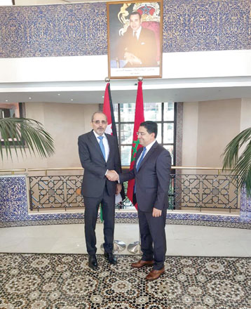 Foreign Minister Ayman Safadi is received by his Moroccan peer, Nasser Bourita, in Rabat on Thursday (Photo courtesy of Royal Court)