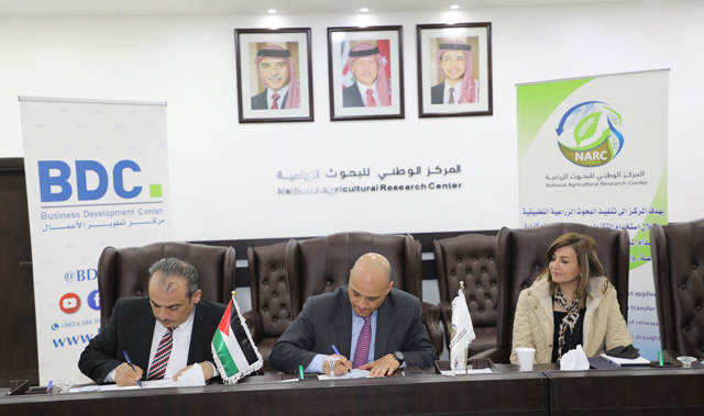 NARC Director General Nizar Haddad and Business Development Centre Director General Ghaleb Hijazi sign a memorandum of understanding to implement several training programmes in agricultural fields (Photo courtesy of BDC)