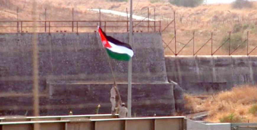 The Jordan Armed Forces-Arab Army raises the national flag in Baqura in this file photo (JT file photo)
