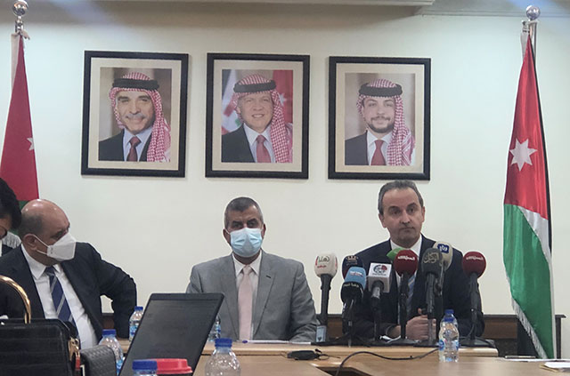 Minister of Energy and Mineral Resources Saleh Al Kharabsheh, Minister of Digital Economy and Entrepreneurship Ahmed Al Hanandeh and EMRC Director Hussein Labboun hold a press conference in Amman on Wednesday (Photo by Batool Ghaith)