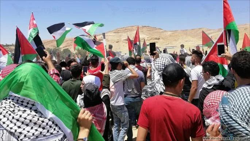 Jordanians gather in Karameh, a town in central Jordan near the King Hussein Bridge border crossing, on Saturday, voicing solidarity with Palestinians and deploring the Israeli aggression on Gaza and occupied Palestinian territories (Photo courtesy of protest organisers)