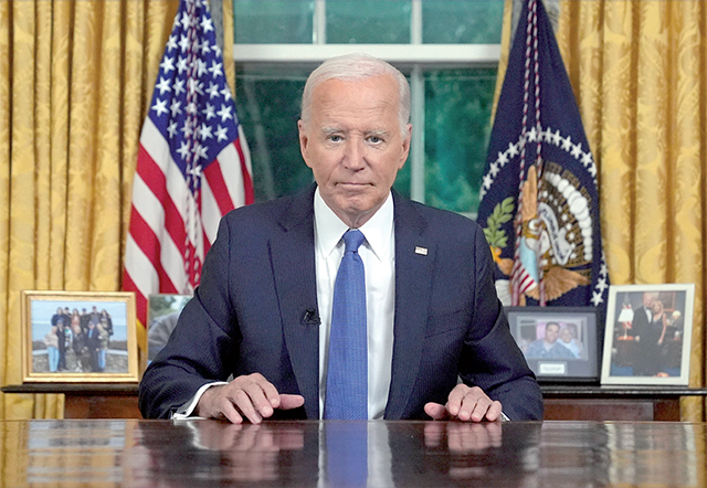 US President Joe Biden pauses as he concludes his address to the nation about his decision to not seek reelection, in the Oval Office at the White House in Washington, DC, on Wednesday (AFP photo)