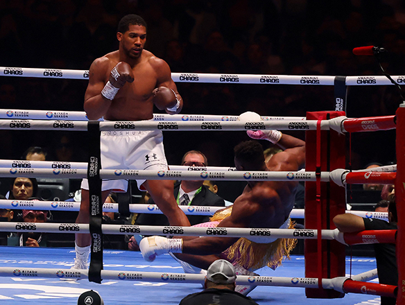 British boxer Anthony Joshua (left) competes with Cameroonian-French boxer Francis Ngannou during their heavyweight boxing match in Riyadh’s Kingdom Arena indoor stadium, on Saturday (AFP photo)