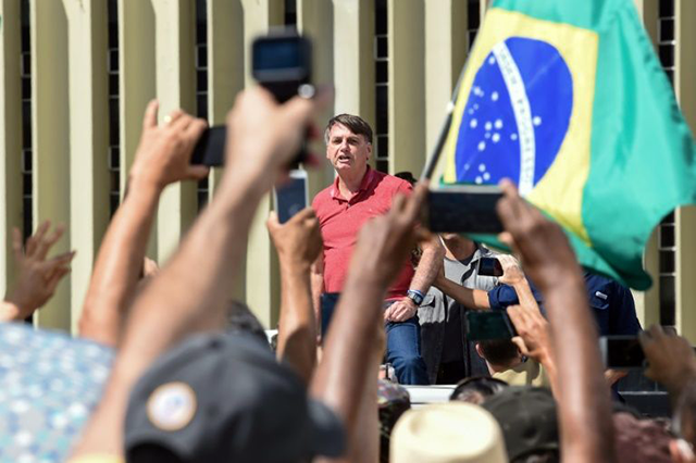 Brazilian President Jair Bolsonaro speaks at a protest in Brasilia on Sunday against quarantine and social distancing measures (AFP photo)