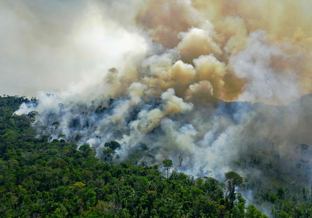 In this file photo taken on August 16, 2020, Aerial view of a burning area of Amazon rainforest reserve, south of Novo Progresso in Para state, Brazil (AFP photo)