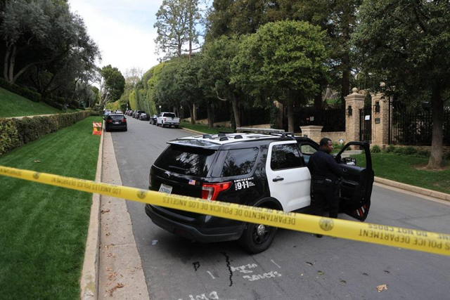 Police officers at Diddy’s LA home (AFP photo)