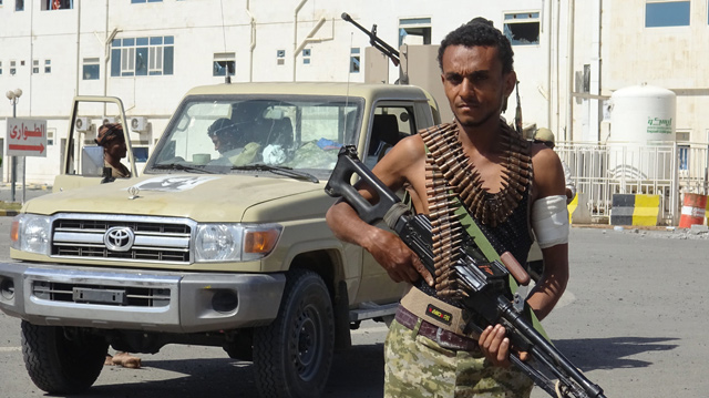 A member of the Yemeni pro-government forces is pictured in front of the May 22 Hospital on the eastern outskirts of port city of Hodeida, on Thursday (AFP photo)