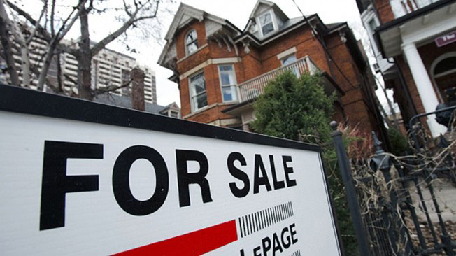 Canadian house prices have risen 36 per cent since June 2009, according to the Teranet-National Bank (Reuters photo)