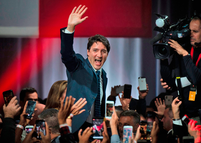 Prime Minister Justin Trudeau celebrates his victory with his supporters at the Palais des Congres in Montreal during Team Justin Trudeau 2019 election night event in Montreal, Canada, on Monday (AFP photo)