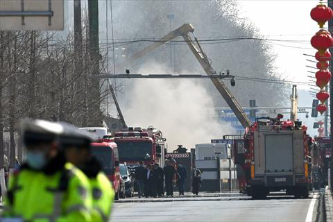 Firefighters work at the scene of a suspected gas explosion in Sanhe, in China’s northern Hebei province on Wednesday (AFP photo)