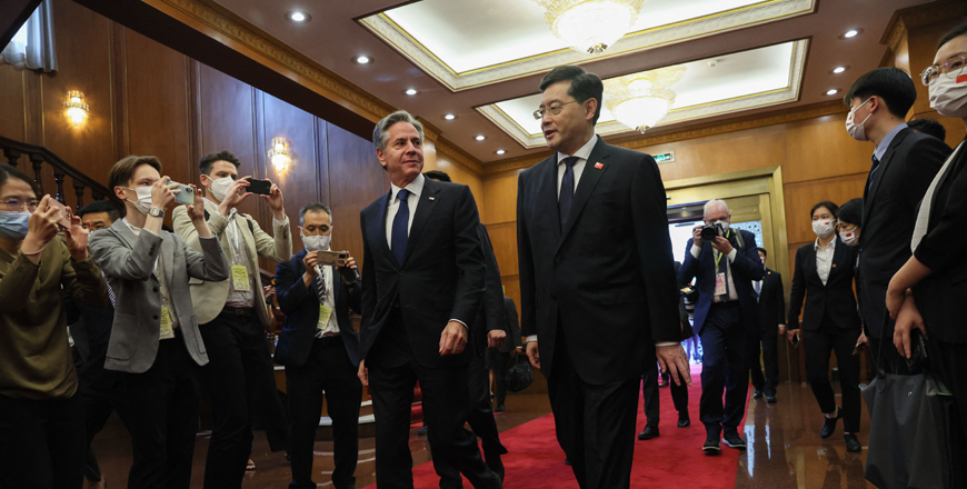 US Secretary of State Antony Blinken (left) walks with China's Foreign Minister Qin Gang ahead of a meeting at the Diaoyutai State Guesthouse in Beijing on Sunday (AFP photo)