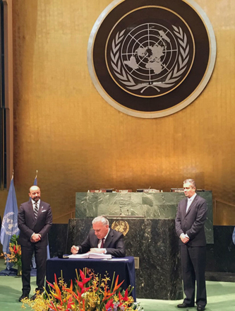 Environment Minister Taher Shakhshir signs the Paris Agreement on Climate Change at the UN in New York on Friday (Petra photo)