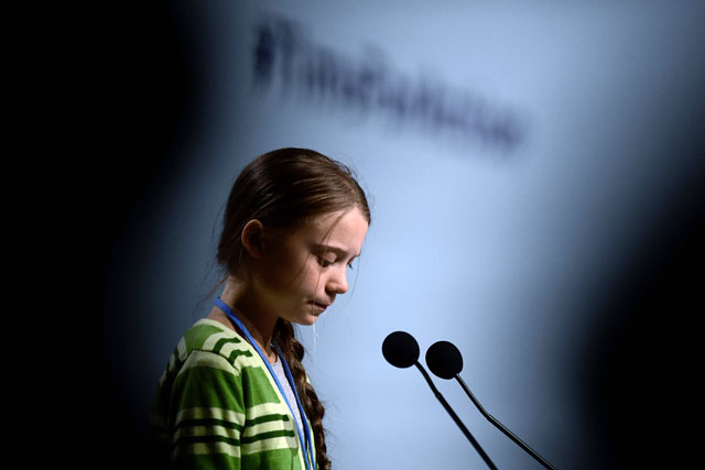 In this file photo taken on December 11, Swedish climate activist Greta Thunberg gives a speech during a high-level event on climate emergency hosted by the Chilean presidency during the UN Climate Change Conference COP25 at the ‘IFEMA - Feria de Madrid’ exhibition centre, in Madrid (AFP photo)