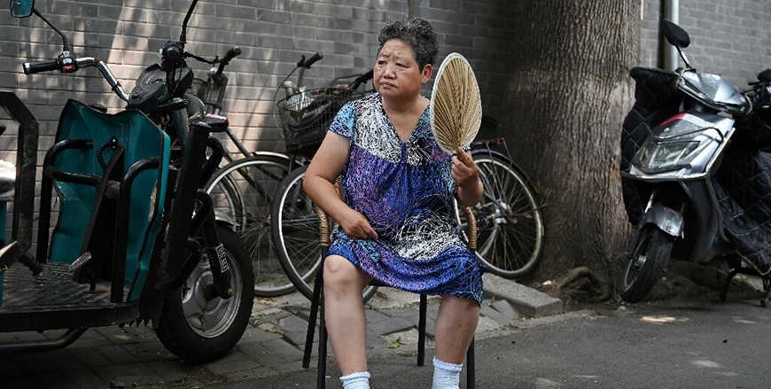 Beijing was hit by a heatwave in late June, prompting authorities to issue an alert (AFP photo)