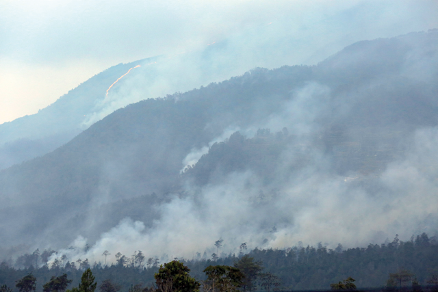 This photo taken on Saturday shows smoke from wildfires on mount Merbabu as seen from Batur village in Semarang, Central Java, amid a prolonged dry season triggered by the El Nino climate phenomenon (AFP photo)