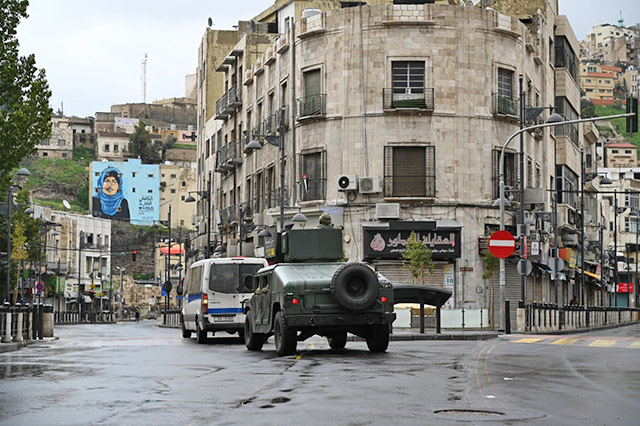 Streets emptied as nationwide curfew began on Saturday morning under Defence Law No. 2 issued by Prime Minister Omar Razzaz on Friday (Photo by Amjad Ghsoun)
