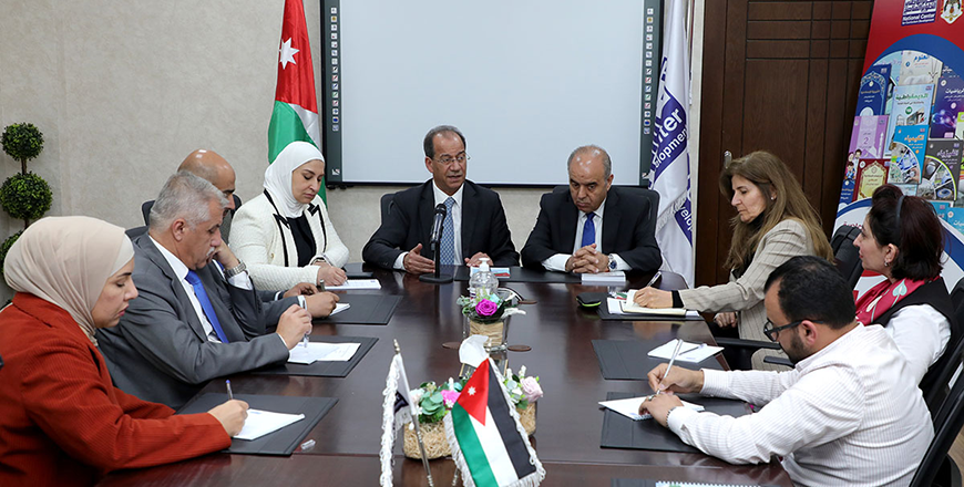 Education Minister Azmi Mahafzah and Minister of Government Communications Faisal Shboul during a meeting with the chairman and members of the committee for integrating media and information education concepts into the curricula on Monday (Petra photo)