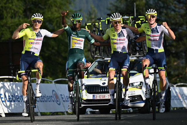 Intermarche - Wanty team’s Eritrean rider Biniam Girmay wearing the sprinter’s green jersey celebrates as he cycles to the finish line with his teammates during the 20th stage of the 111th edition of the Tour de France cycling race, 132,8 km between Nice and Col de la Couillole, south-eastern France, on Saturday (AFP photo)