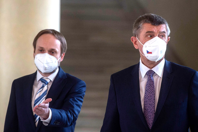 Czech Republic's newly appointed Foreign Minister Jakub Kulhanek (left) and Czech Prime Minister Andrej Babis answer journalists during their joint press conference at the Cernin's Palace in Prague on Wednesday (AFP photo)