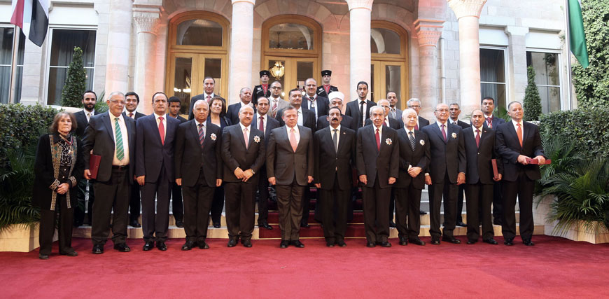 His Majesty King Abdullah with Jordanians who received medals during the official national celebration marking Jordan’s 70th Independence Day at Raghadan Palace on Wednesday (Photo courtesy of Royal Court)