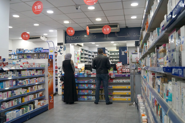   Demand for the flu vaccine and face masks has risen significantly, according to pharmacies (Photo by Amjad Ghsoun)