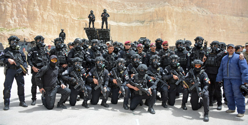   Jordanian soldiers demonstrate their skills during the opening ceremony of the 11th annual Warrior Competition at the King Abdullah Special Operations Training Centre on Sunday (Photo by Amjad Ghsoun)