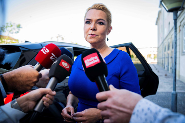 Former Danish Minister Inger Stoejberg talks to the press as she arrives to the Danish Foreign Ministry, Eigtved's Warehouse to face an impeachment court over her policy of separating asylum seeking couples who arrived in the country, on Thursday in Copenhagen (AFP photo)