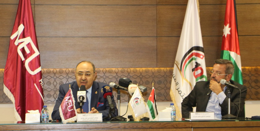 Minister of State for Media Affairs Sakher Dudin speaks on Saturday during a symposium about the government’s stimulus package of employing journalism fresh graduates, held in the Middle East University (Petra photo)