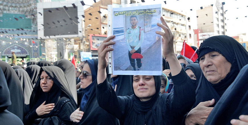 Women mourn during a funeral of the victims of assault that killed 25 people in the streets of the southwestern Iranian city of Ahvaz, Iran, on Monday (Reuters photo)