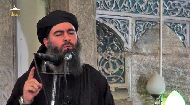 Leader of the Daesh terrorist group, Abu Bakr Al Baghdadi, addressing Muslim worshippers at a mosque in the militant-held northern Iraqi city of Mosul on July 5, 2014 (AFP photo)