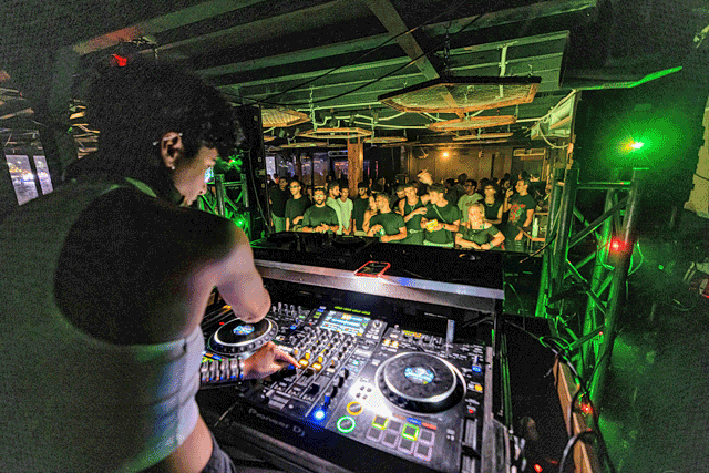 People attend a music performance by Egyptian DJ Yas Meen Selectress at a restaurant-turned-dance-hall in Egypt’s capital Cairo, on September 10, 2022 (AFP photo)