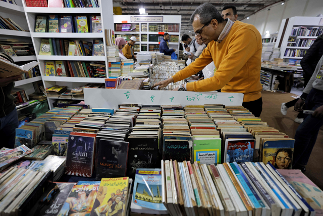 In this photo taken on January 29, people visit the 54th Cairo International Book Fair in Cairo (AFP photo)