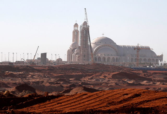 Labourers complete work at the new Coptic the ‘Nativity of Christ’ Cathedral before Sunday’s Coptic Christmas Eve Mass in the new administrative capital  east of Cairo, Egypt, on Thursday (Reuters photo)