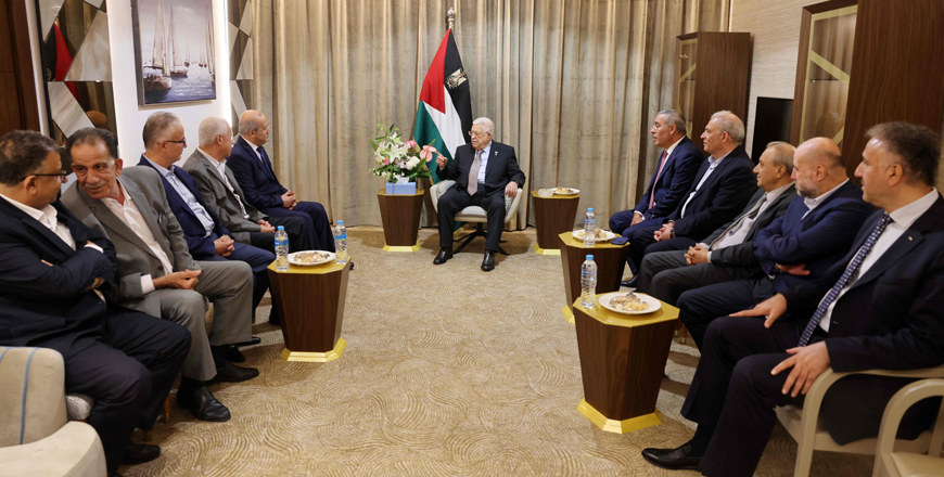 This handout photo provided by the Palestinian Authority's press office on Saturday shows Palestinian President Mahmoud Abbas meeting with a delegation of the Popular Front for the Liberation of Palestine ahead of unity talks between Palestinian factions hosted by Egypt in El Alamein (AFP photo)