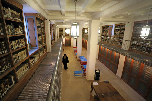 Librarian, Father Justin of Sinai, walks inside the library of St Catherine’s Monastery in South Sinai, Egypt, on March 6 (Reuters photo)