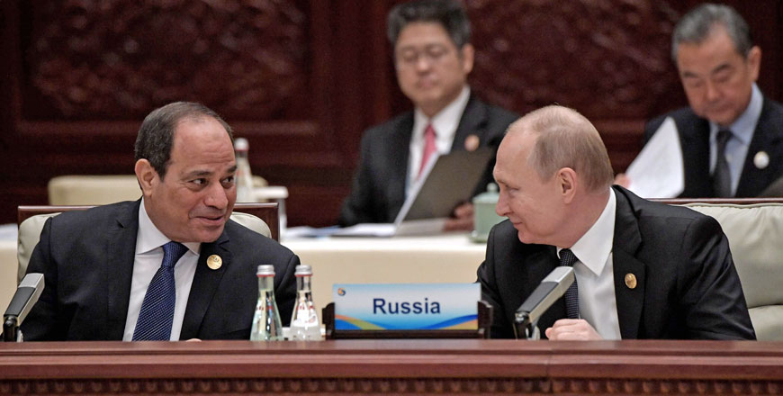 Russia’s President Vladimir Putin (right) listens to Egypt’s President Abdel Fattah Sisi before a roundtable summit session on the final day of the Belt and Road Forum, in Beijing, China, on Saturday (AFP photo)