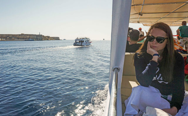 A photo taken on February 10 shows a tourist sitting in a boat off the Egyptian Red Sea resort of Sharm El Sheikh (AFP photo)