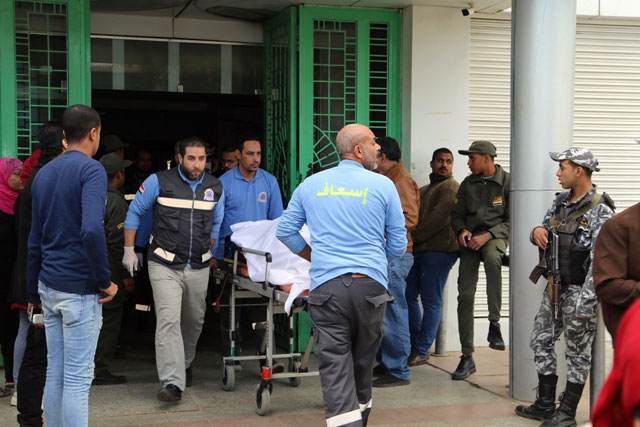 This handout photo released by the Suez Governorate Media Office on Saturday shows paramedics transporting one of the victims who were injured in a bus crash on the road to the Ain Sokhna resort east of the Egyptian capital Cairo (AFP photo)