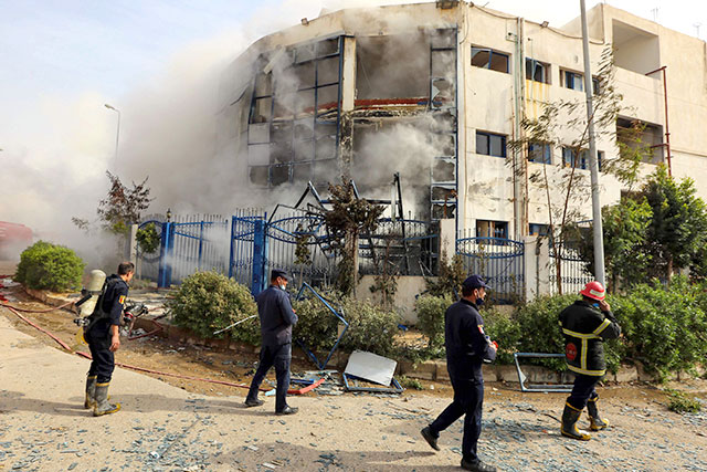 Smoke rises from a clothing factory on the eastern outskirts of the Egyptian capital Cairo, on Thursday (AFP photo)