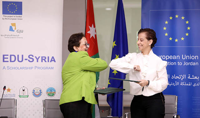 EU Ambassador to Jordan Maria Hadjitheodosiou (right) and President of the German Jordanian University Manar Fayyad (left) sign an agreement on Wednesday under which the EU will grant 15 million euros to provide 2,245 vulnerable Jordanians and Syrian refugees with full scholarships to higher education institutions (Petra photo)