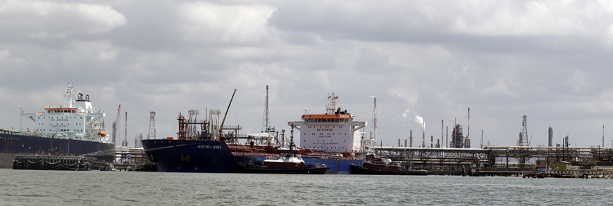 In this June 28, 2011 file photo, an oil tanker is docked at the ExxonMobil Baytown complex along the Houston Ship Channel in Baytown, Texas (AP photo)