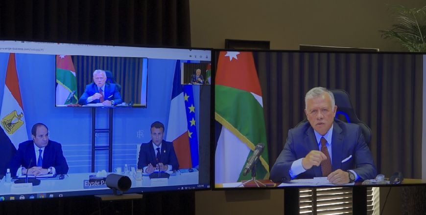 His Majesty King Abdullah holds talks with Egypt President Abdel Fattah El Sisi and France President Emmanuel Macron, via teleconference, on Tuesday (Photo courtesy of Royal Court)