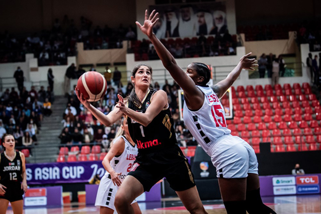 Jordan’s Dana Fadda is guarded by Lebanon’s Brittany Janelle Denson during their FIBA Women’s Asia Cup Division B final match in Amman on Saturday  (Photo courtesy of fiba.com)