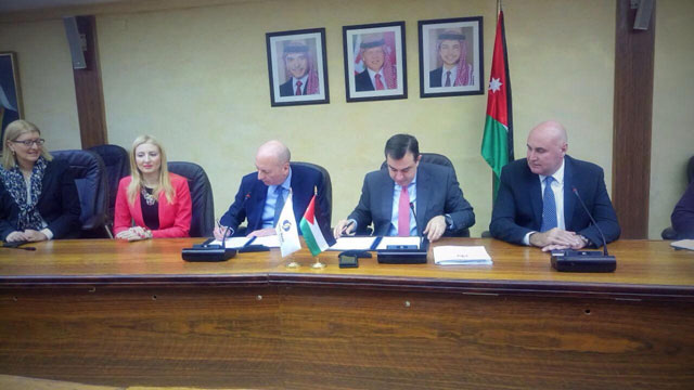 Planning Minister Imad Fakhoury signs an agreement with EBRD Secretary General Enzo Quattrociocche to host the bank’s 27th Annual Meeting and Business Forum, scheduled to be held at the Dead Sea on May 9-10, on Tuesday (Photo by Ana V. Ibáñez Prieto)