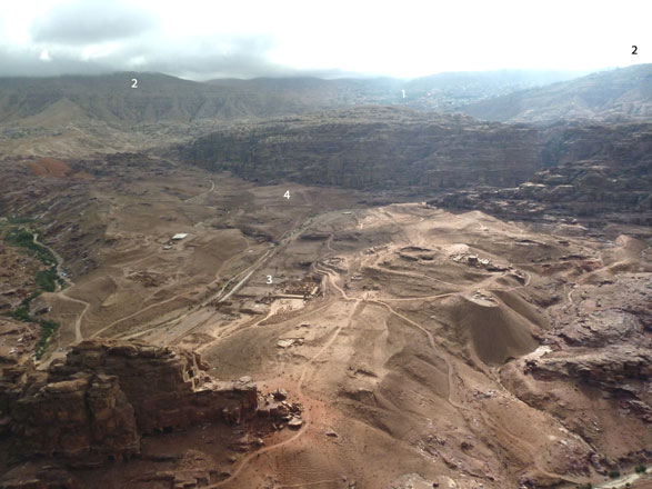 The aerial view of the Petra Valley, the Shara Mountains, town of Wadi Musa and the Great Temple (Photo courtesy by S.G. Schmid)