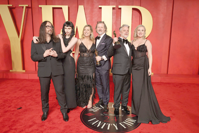 From left to right: Sean Lennon, Kemp Muhl, a guest, Dave Mullins, Brad Booker, and a guest attend the 2024 Vanity Fair Oscar Party on Sunday in Beverly Hills, California (AFP photo)