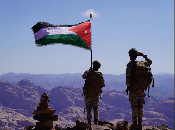 A group of Jordan Armed Forces-Arab Army (JAF) personnel raised the Jordanian flag atop Jabal Umm ad-Dami, the highest peak in the Kingdom (Photo courtesy of JAF)