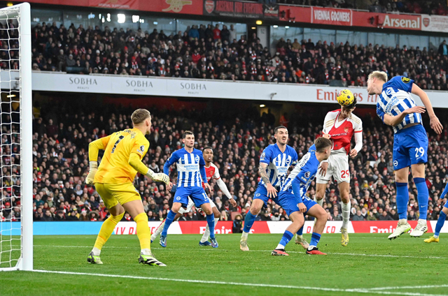 Brighton’s English midfielder #41 Jack Hinshelwood pulls on the shirt of Arsenal’s German midfielder #29 Kai Havertz as Havertz headers the ball goalwards during the English Premier League football match between Arsenal and Brighton and Hove Albion at the Emirates Stadium in London on Sunday (AFP photo)