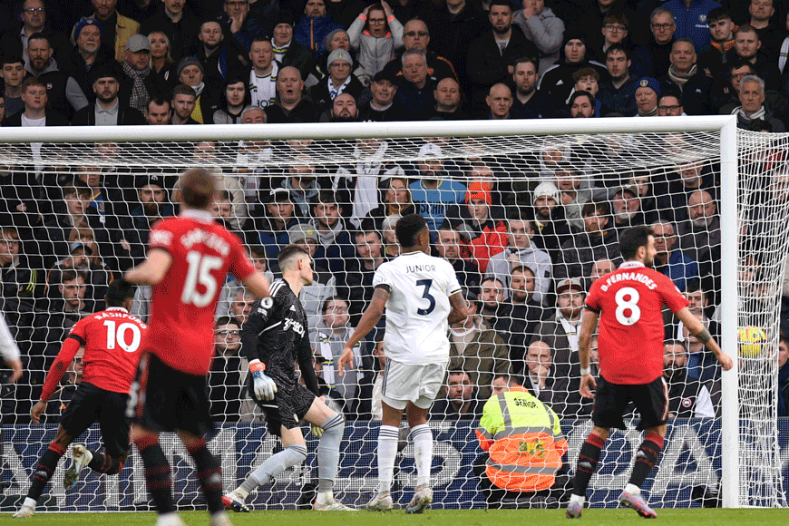 Manchester United's English striker Marcus Rashford (left) scores the opening goal of the English Premier League football match between Leeds United and Manchester United at Elland Road in Leeds, northern England, on Sunday (AFP photo)