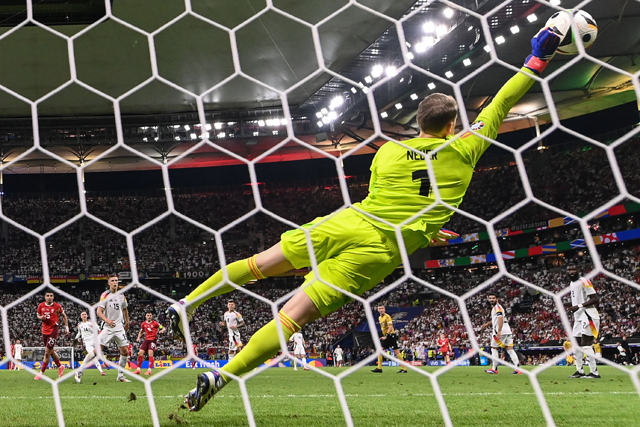 Germany’s goalkeeper #01 Manuel Neuer makes a save during the UEFA Euro 2024 Group A football match between Switzerland and Germany at the Frankfurt Arena in Frankfurt am Main on June 23 (AFP photo)